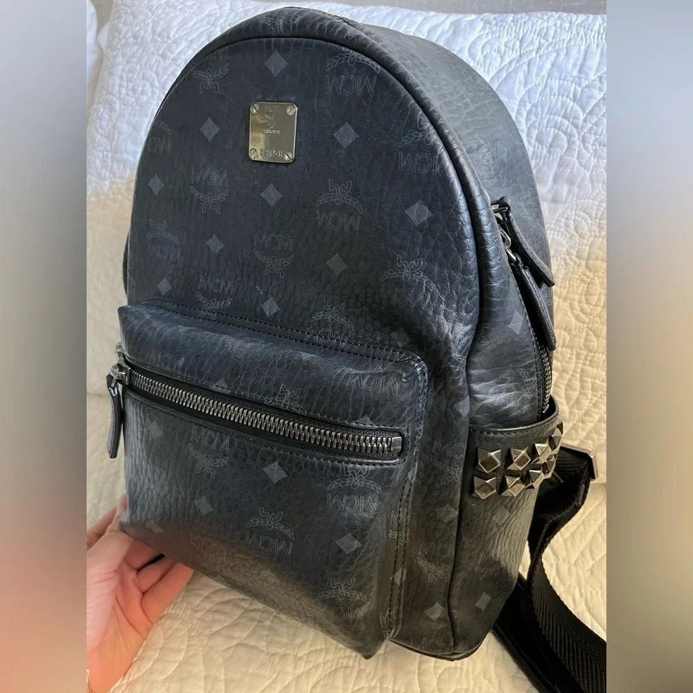 Stark Side Studs Backpack In Visetos, black side pockets w/stud details leather